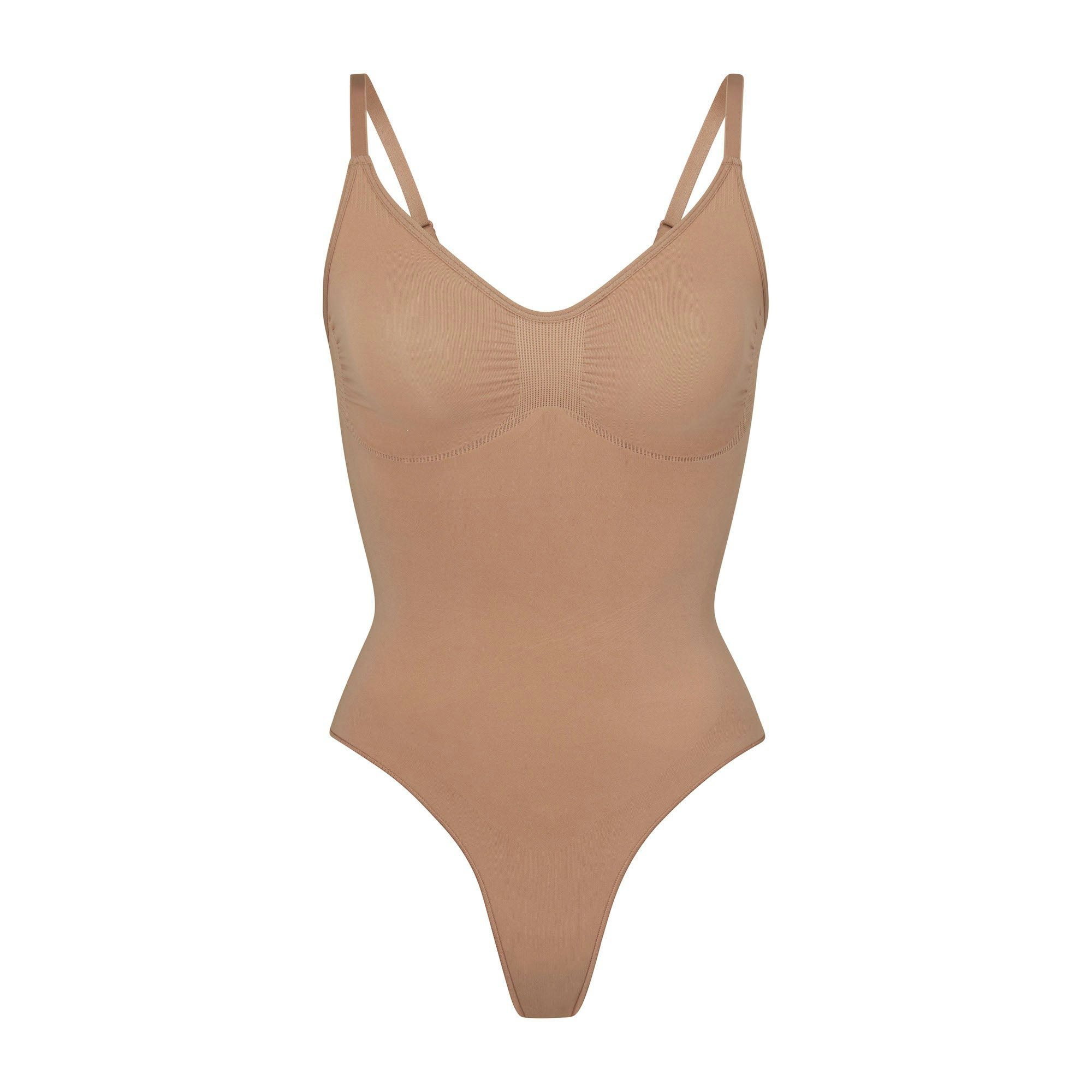 SEAMLESS SCULPT THONG BODYSUIT | SIENNA (SHAPEWEAR BODYSUITS) LAYS FLAT ON A WHITE BACKGROUND | FLT