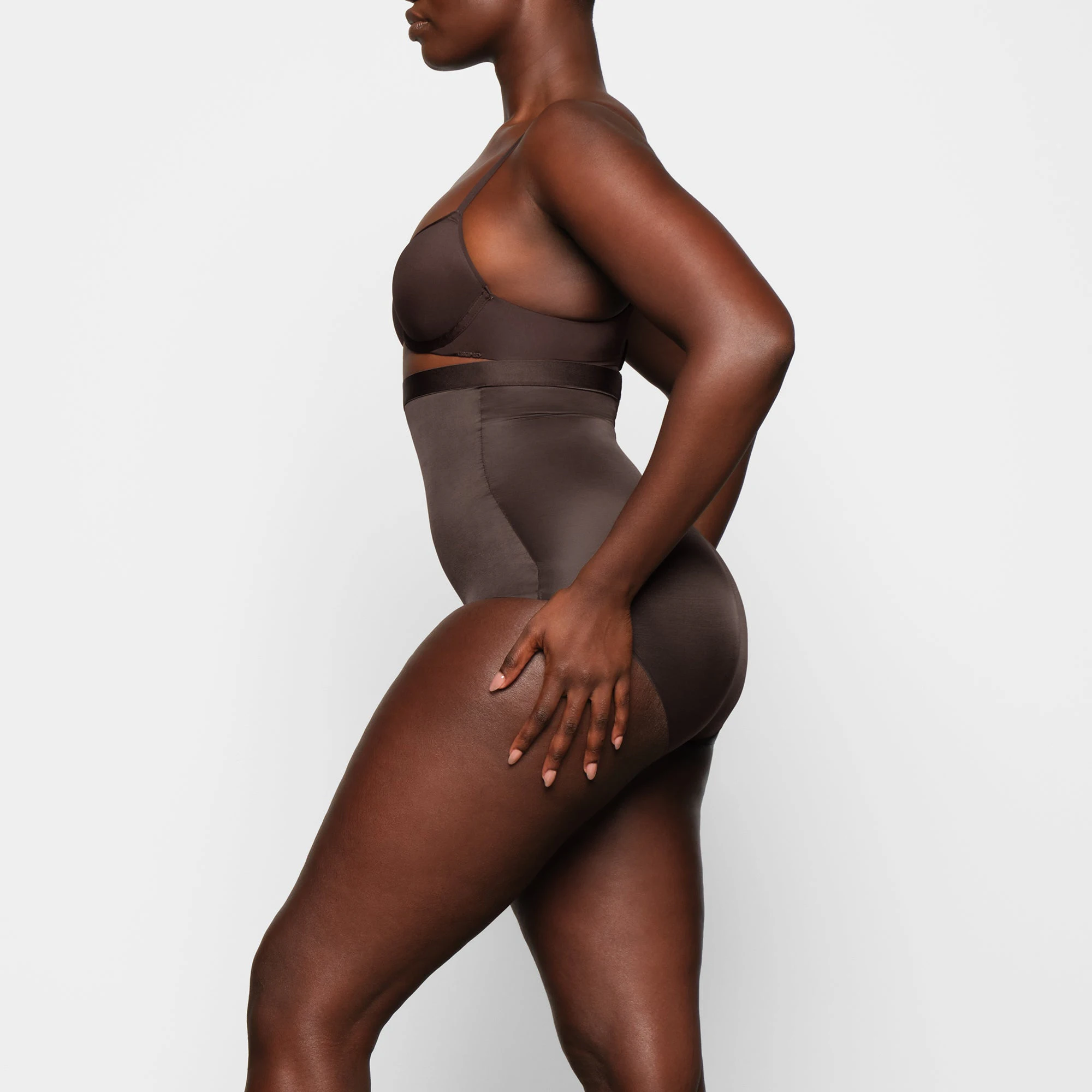 BARELY THERE HIGH WAIST BRIEF WORN BY A MODEL IN SIDE VIEW
