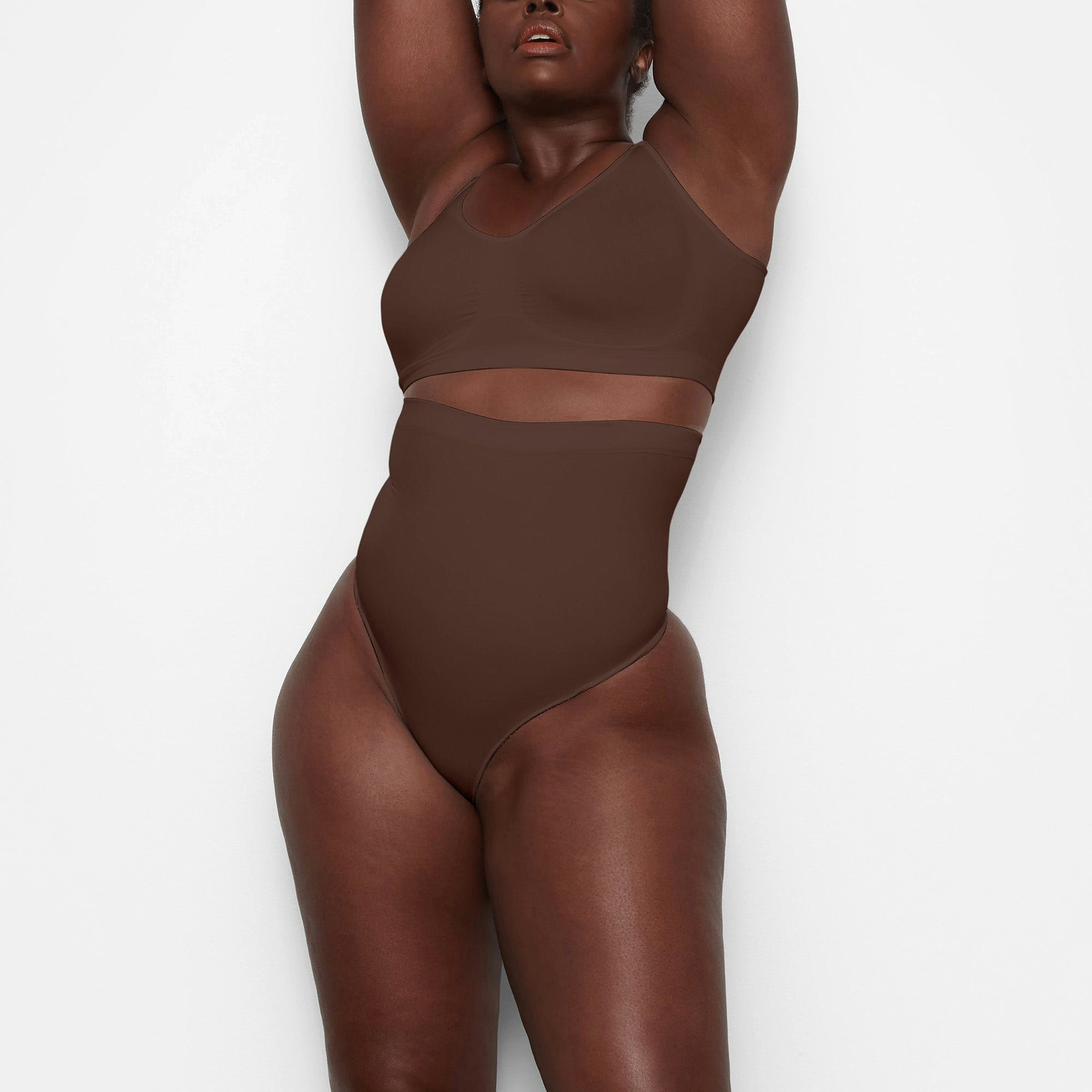 SEAMLESS SCULPT HIGH-WAISTED THONG WORN BY A MODEL IN FRONT VIEW | SEE: 2X, 3X, 4X