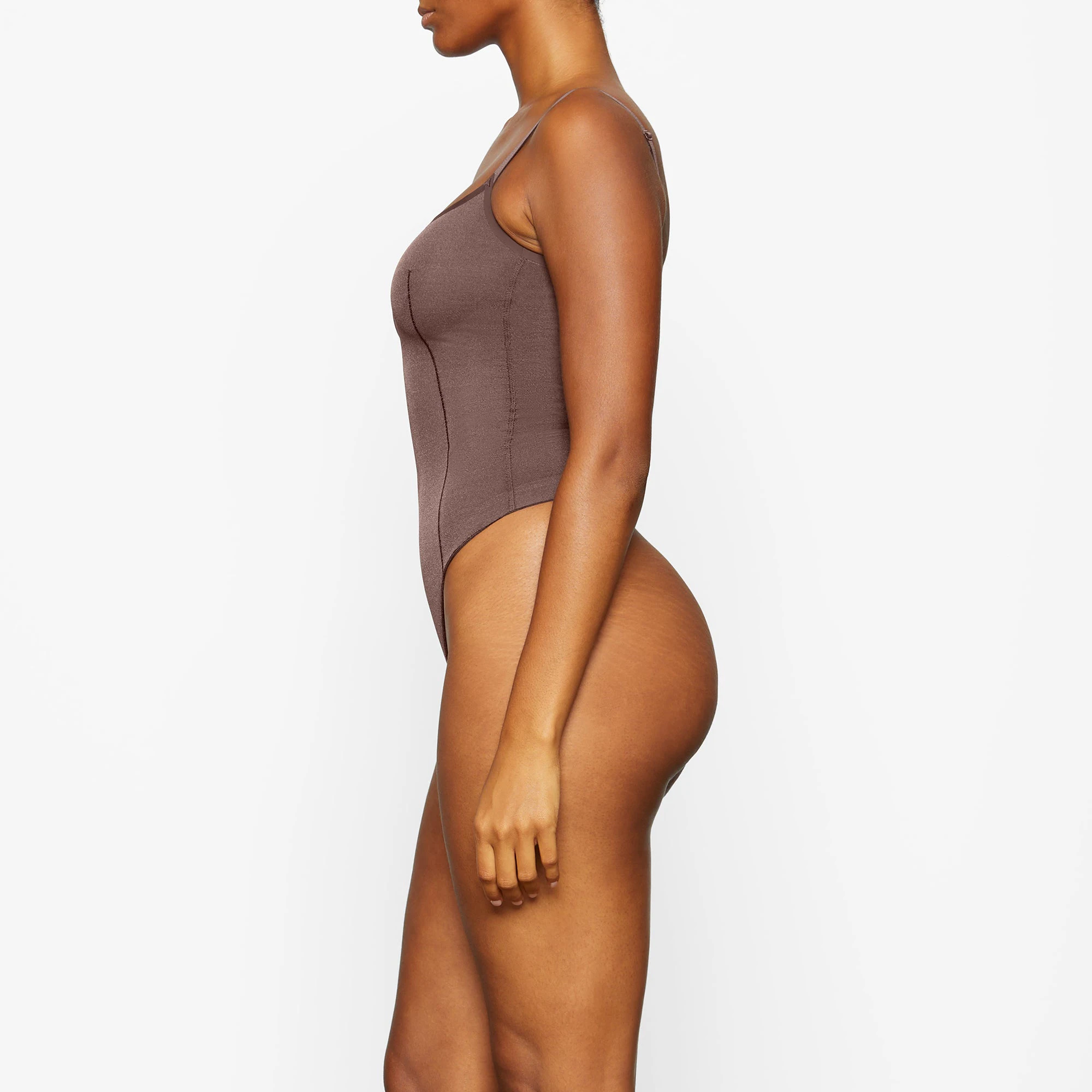 SHEER SCULPT BODYSUIT WORN BY A MODEL IN SIDE VIEW