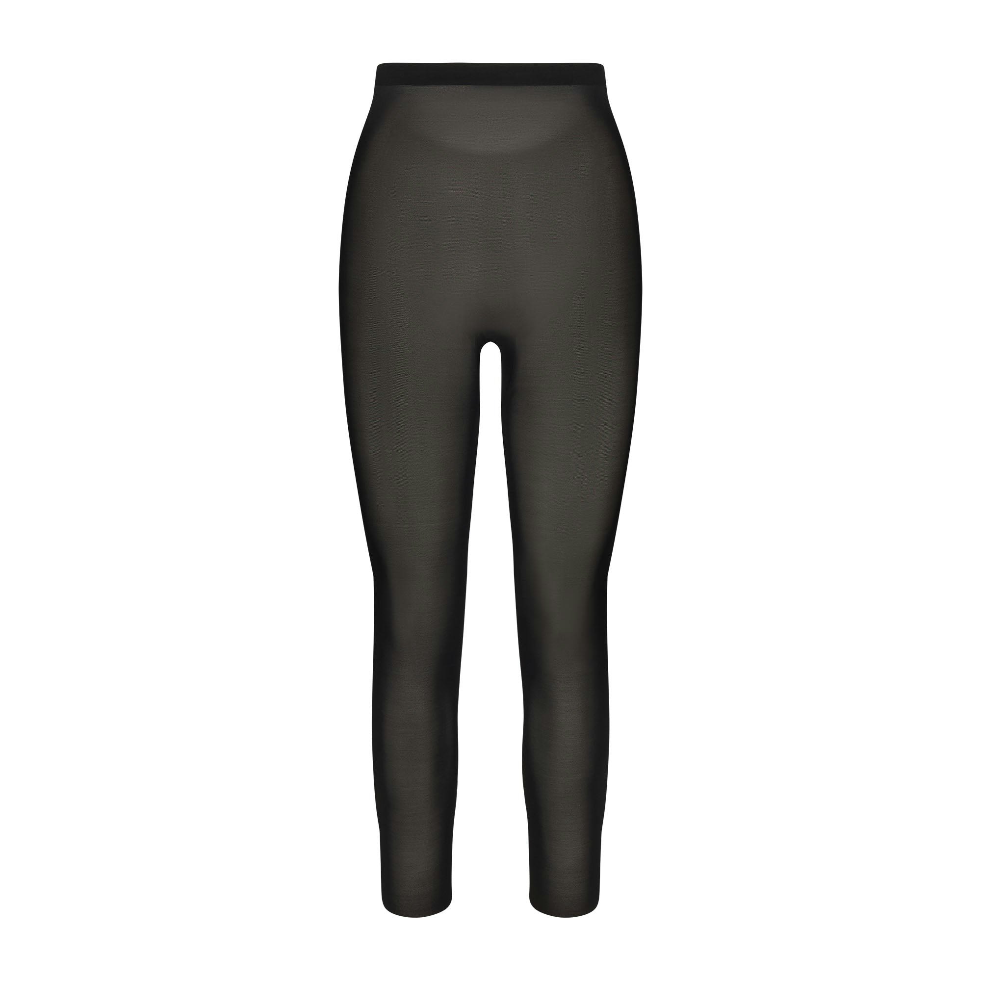 SHEER SCULPT LOW BACK LEGGING LAYS FLAT ON A WHITE BACKGROUND | FLT