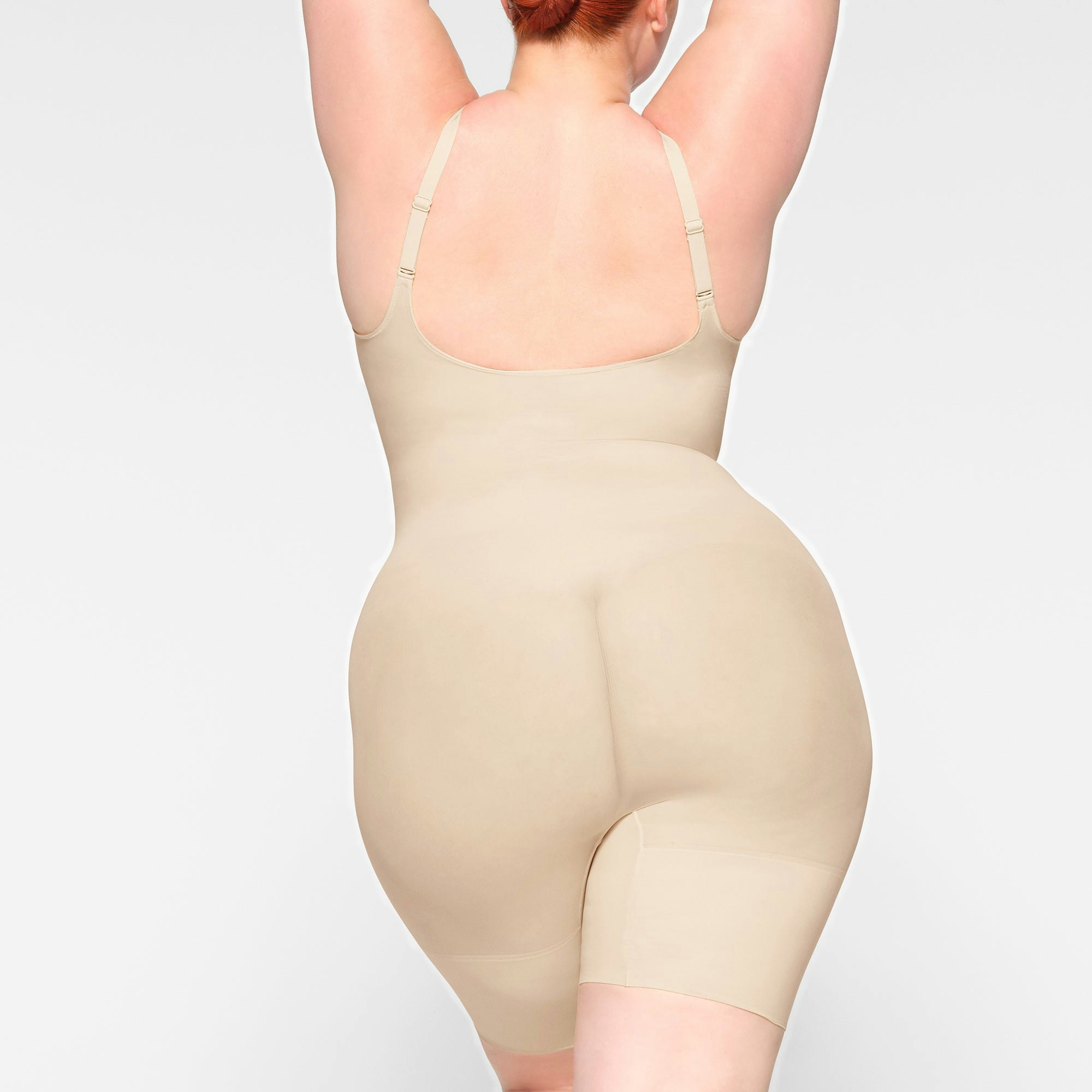 EVERYDAY SCULPT MID THIGH BODYSUIT ON A MODEL BACK VIEW
