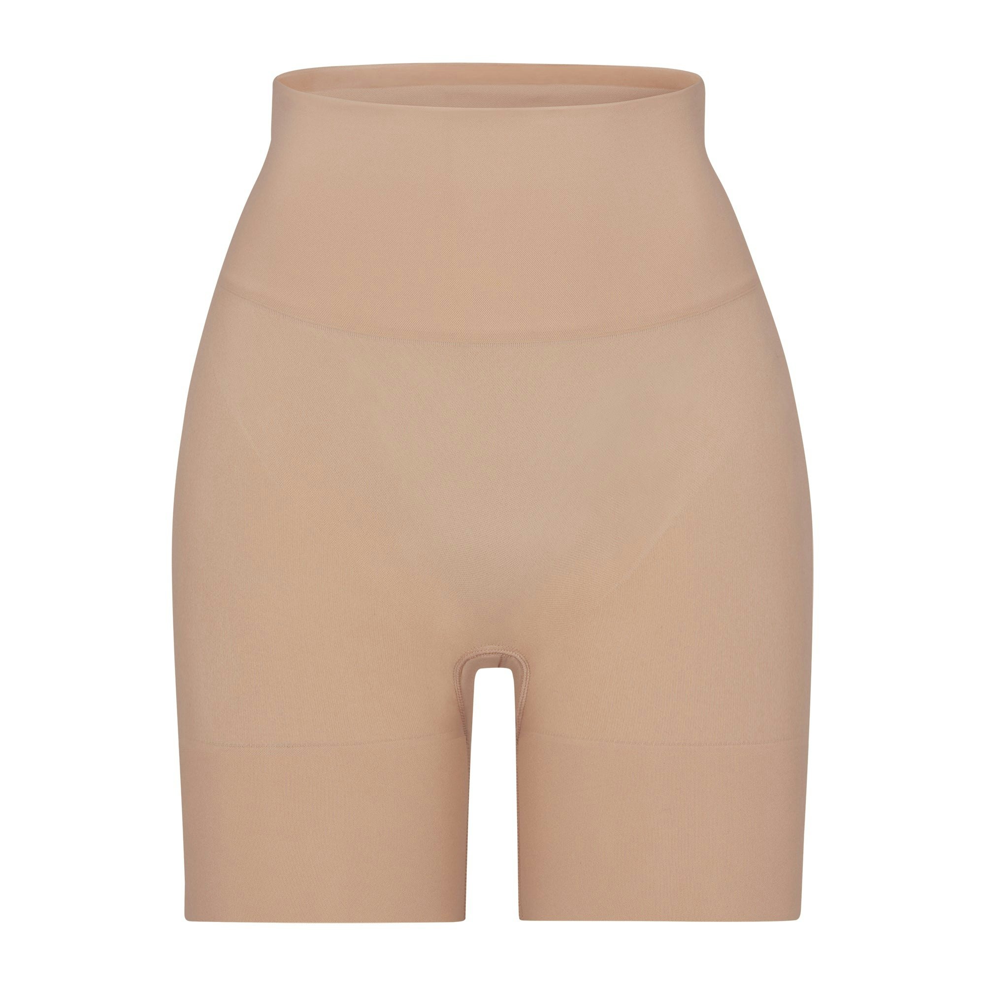 BUTT ENHANCING SHORT | CLAY (SHAPEWEAR SHORTS, SHAPEWEAR) LAYS FLAT ON A WHITE BACKGROUND | FLT