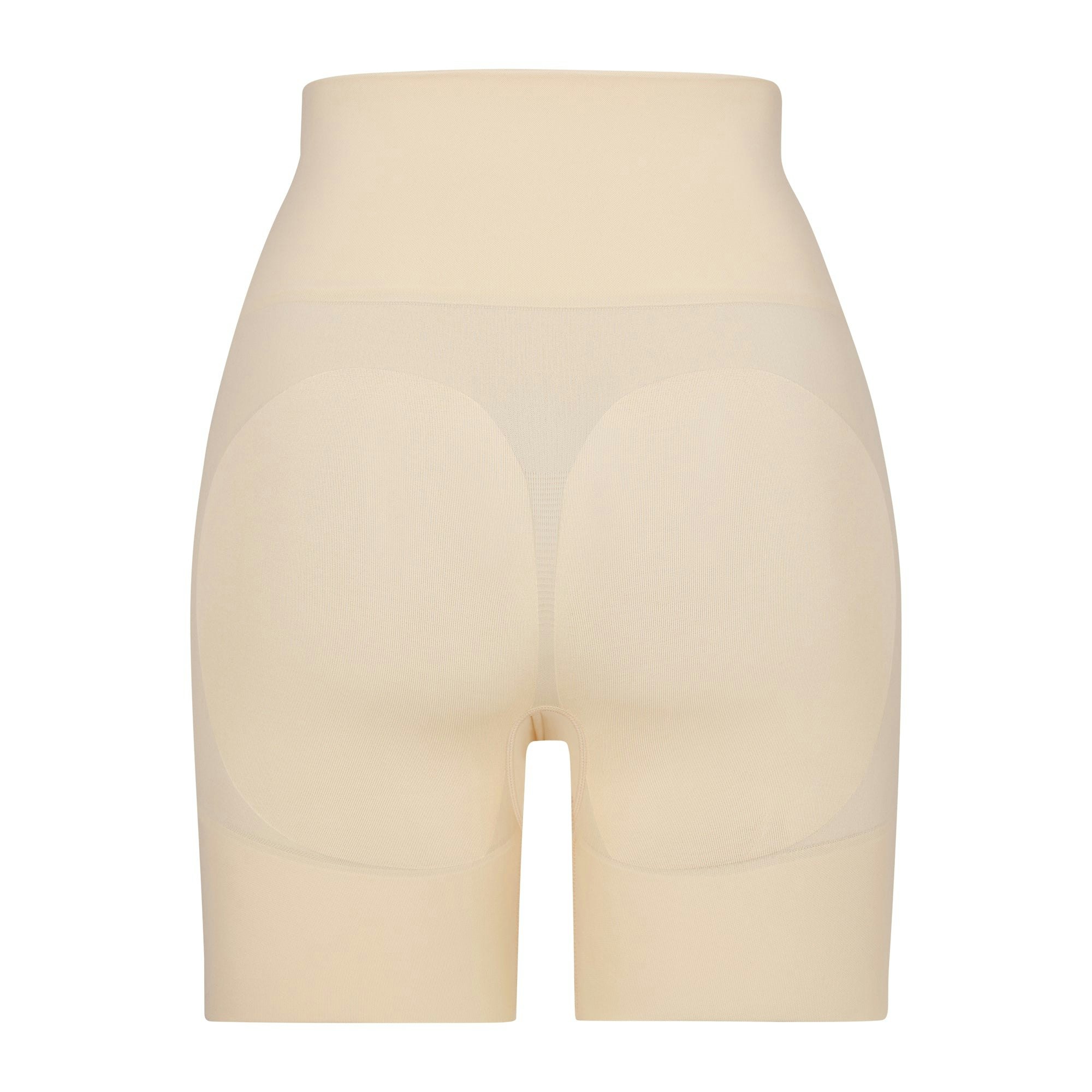 BUTT ENHANCING SHORT LAYS FLAT ON A WHITE BACKGROUND | FLT