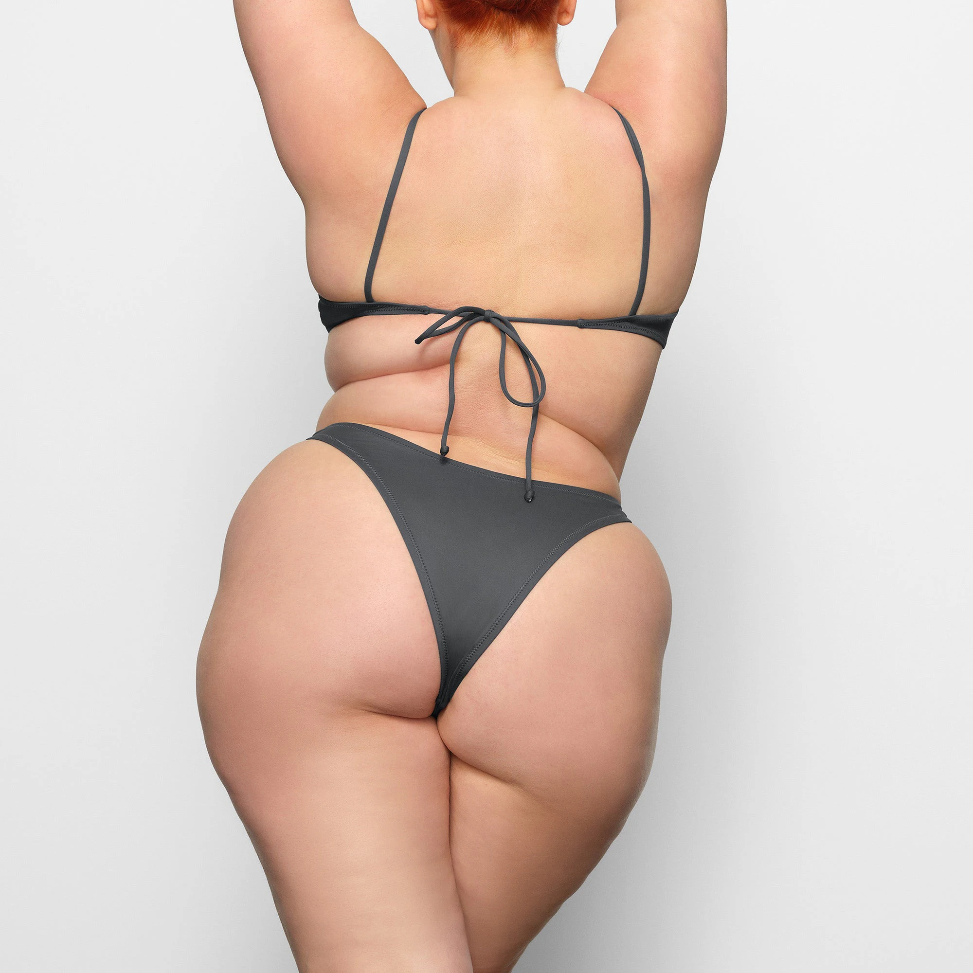 SWIM MICRO SCOOP BIKINI TOP WORN BY A MODEL IN BACK VIEW