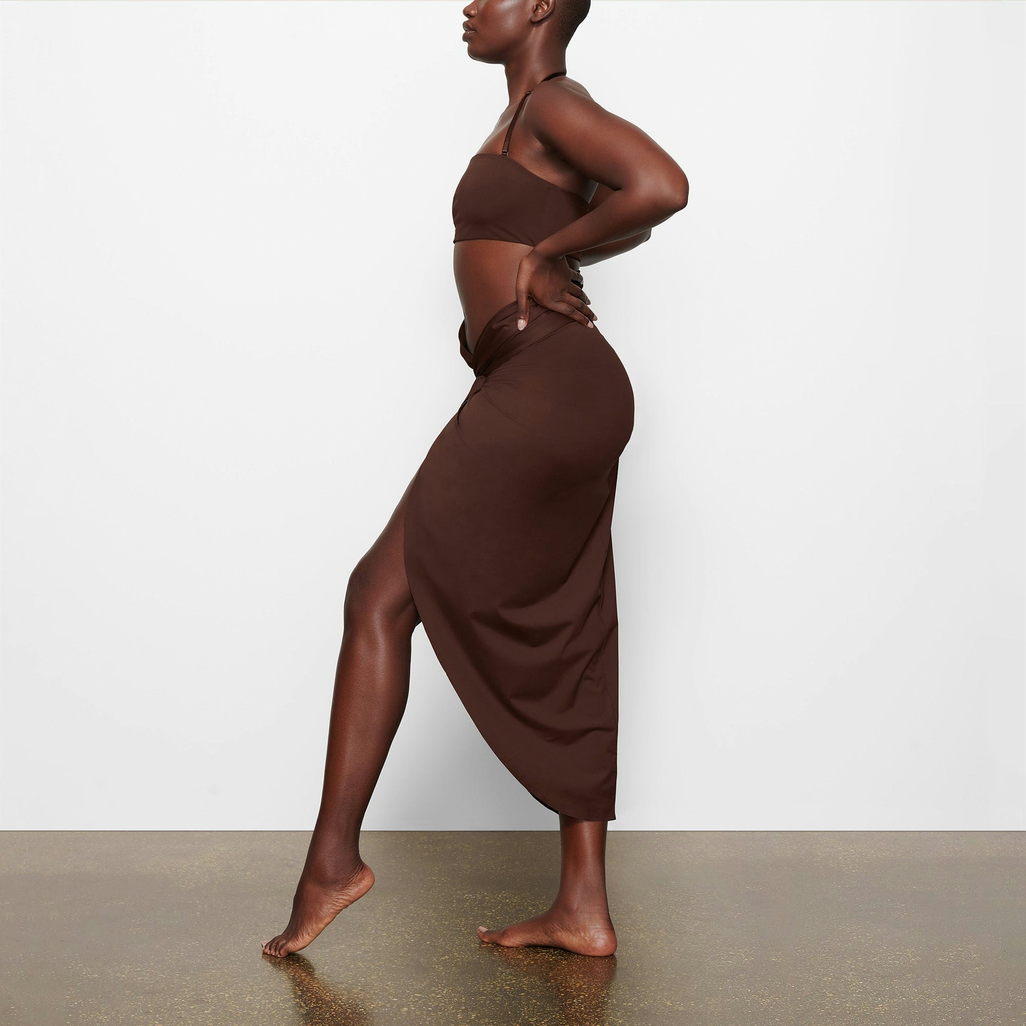 SWIM BANDEAU BIKINI TOP WORN BY A MODEL IN FRONT VIEW