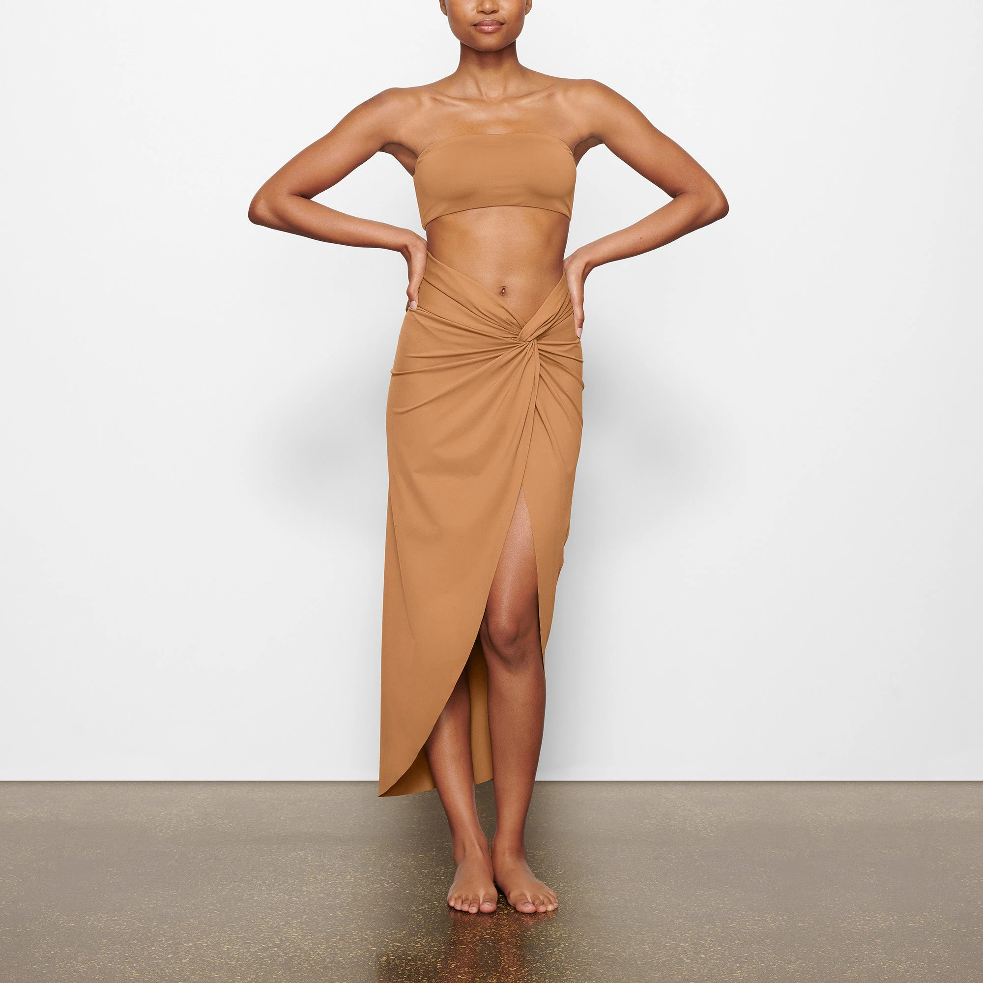 SWIM BANDEAU BIKINI TOP WORN BY A MODEL IN FRONT VIEW