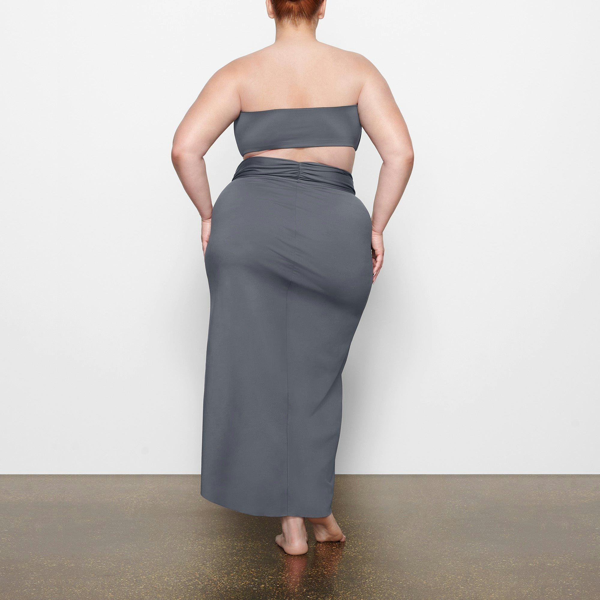 SWIM BANDEAU BIKINI TOP ON A MODEL BACK VIEW