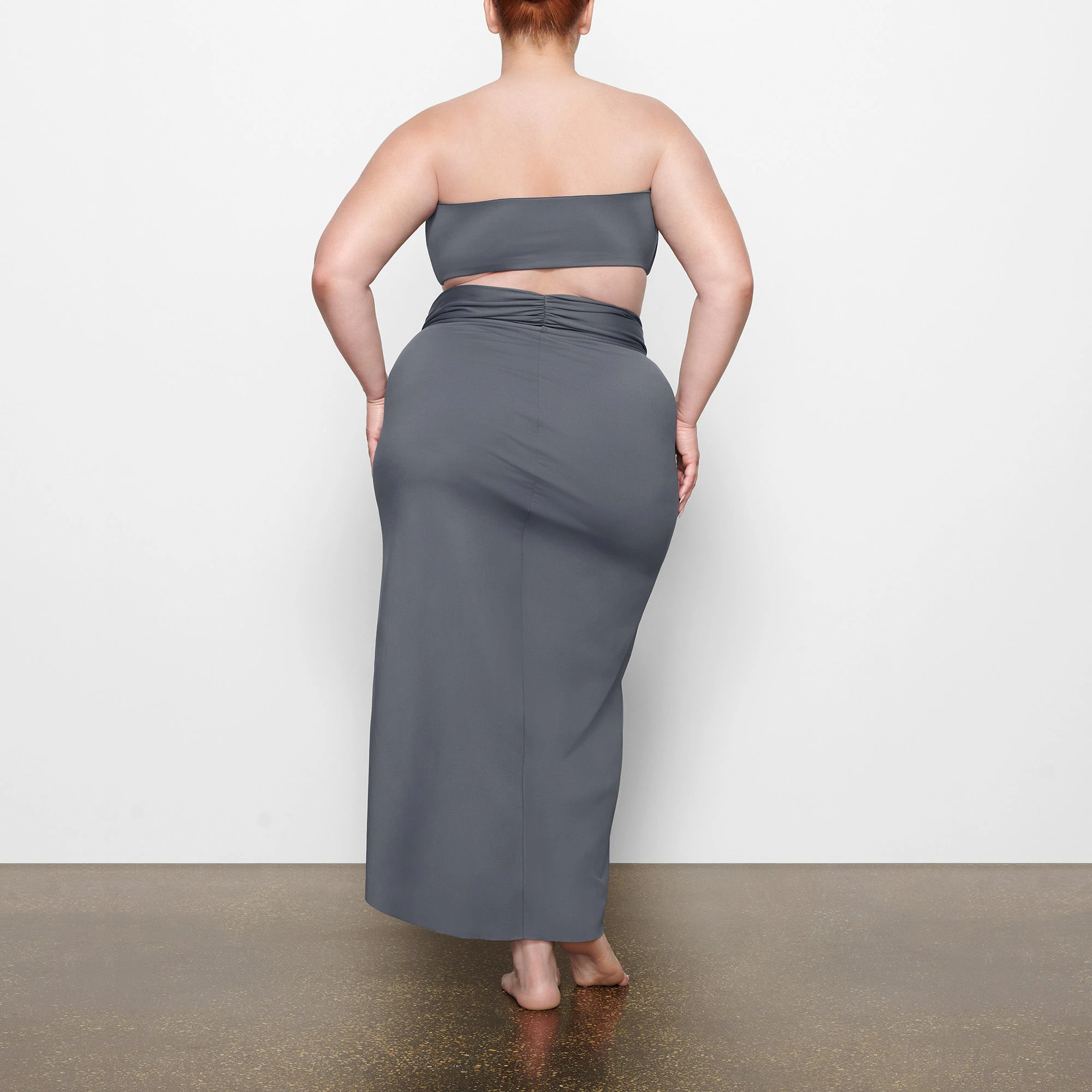 SWIM BANDEAU BIKINI TOP ON A MODEL BACK VIEW