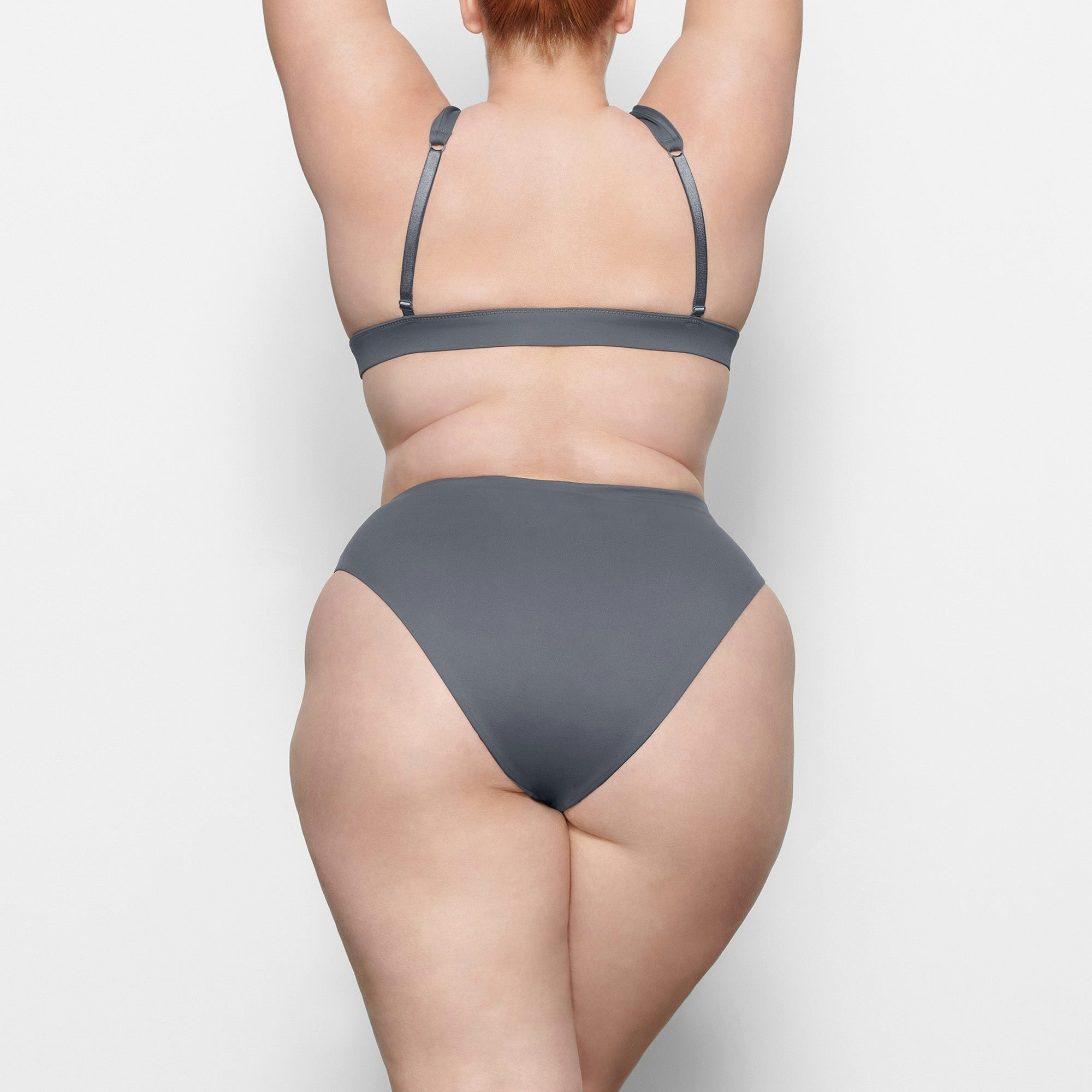 SWIM PLUNGE BIKINI TOP ON A MODEL BACK VIEW