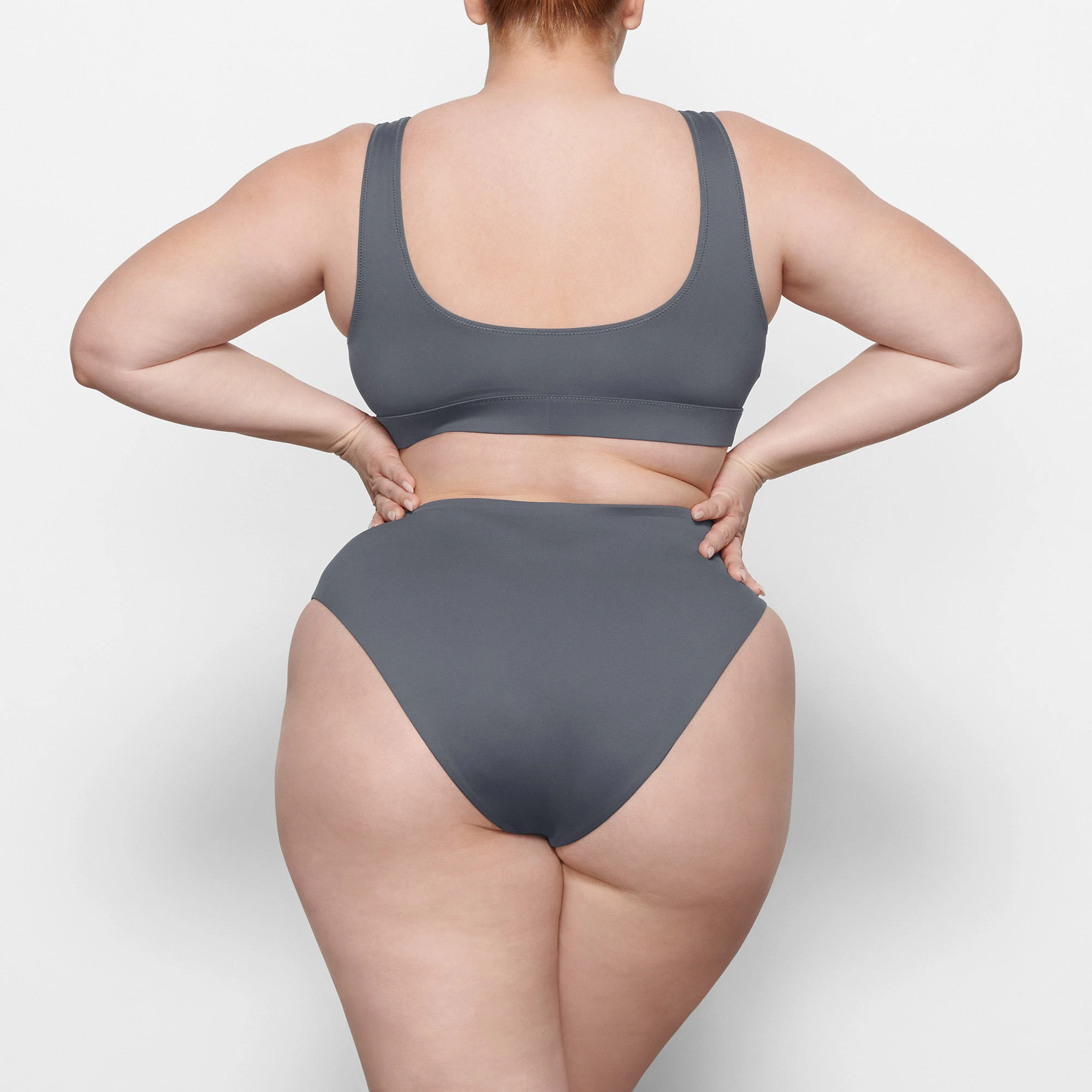 SWIM TANK BIKINI TOP WORN BY A MODEL IN BACK VIEW