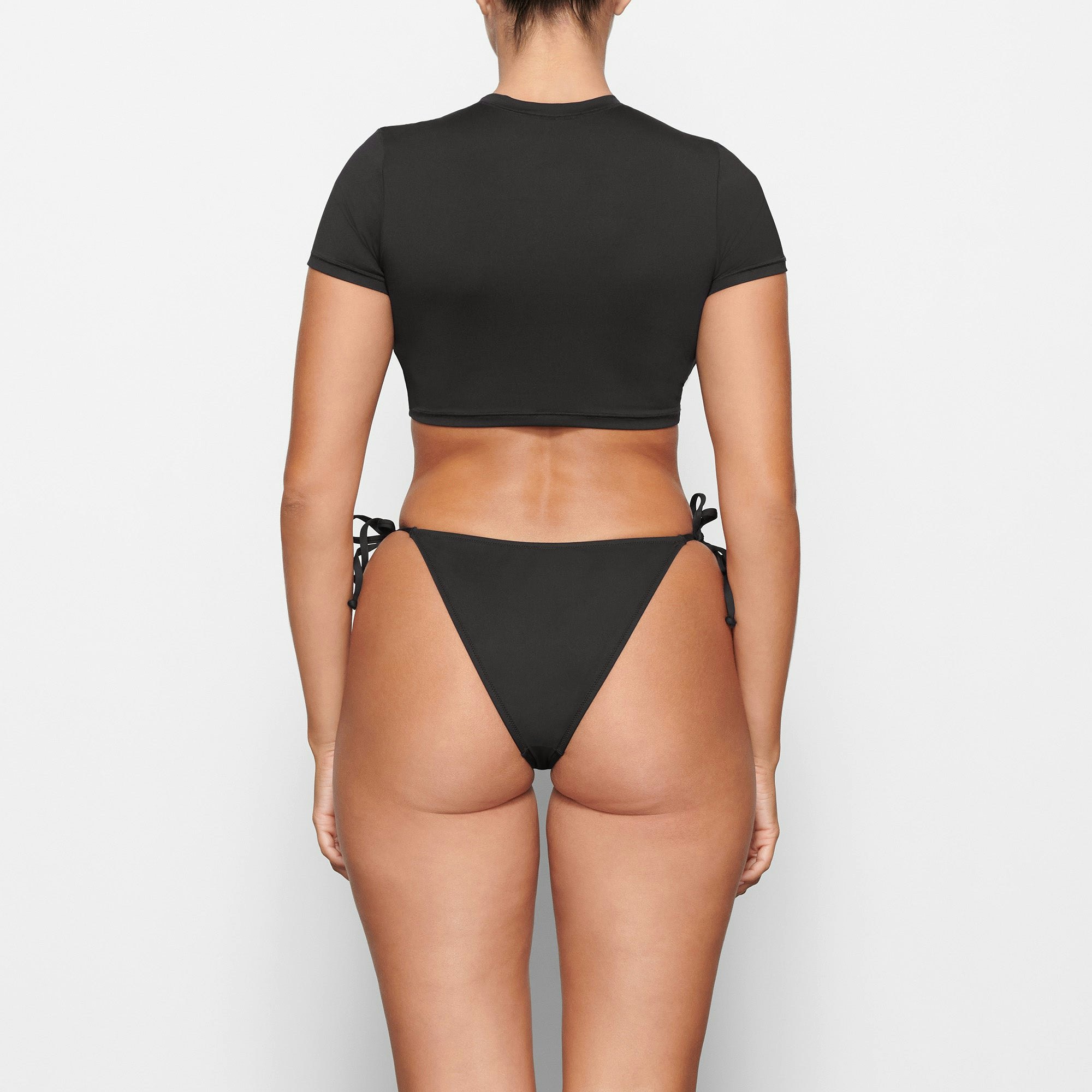 SWIM T-SHIRT ON A MODEL BACK VIEW