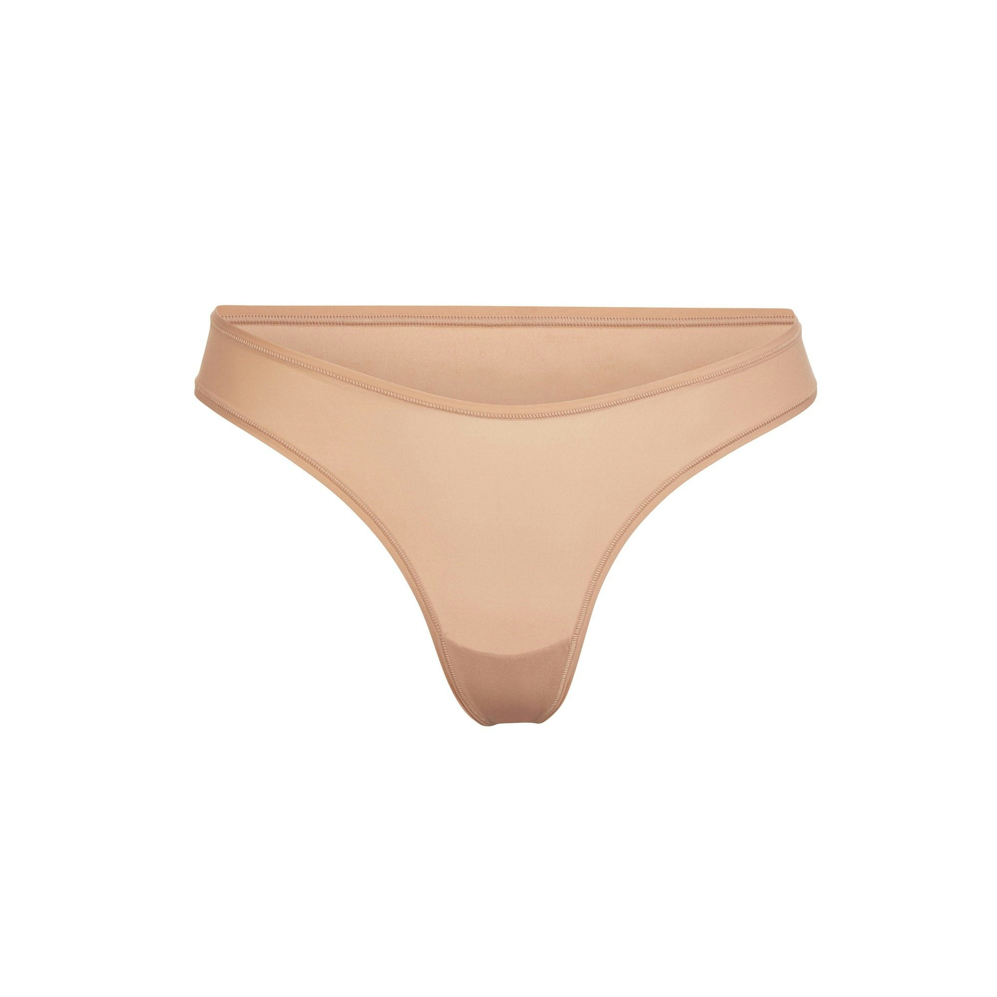 FITS EVERYBODY DIPPED FRONT THONG | OCHRE (THONGS, PANTIES) LAYS FLAT ON A WHITE BACKGROUND | FLT