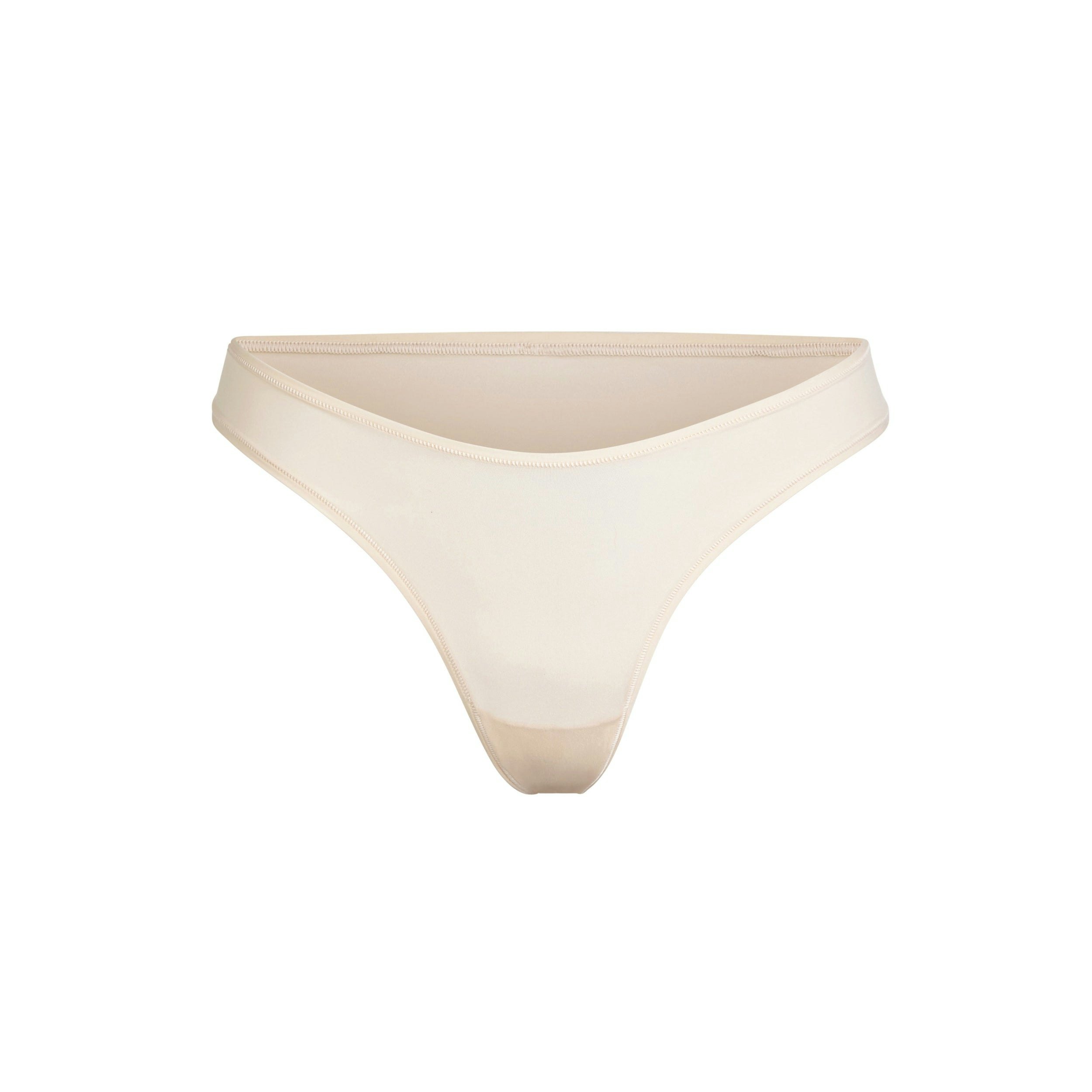 FITS EVERYBODY DIPPED FRONT THONG | SAND (THONGS, PANTIES) LAYS FLAT ON A WHITE BACKGROUND | FLT