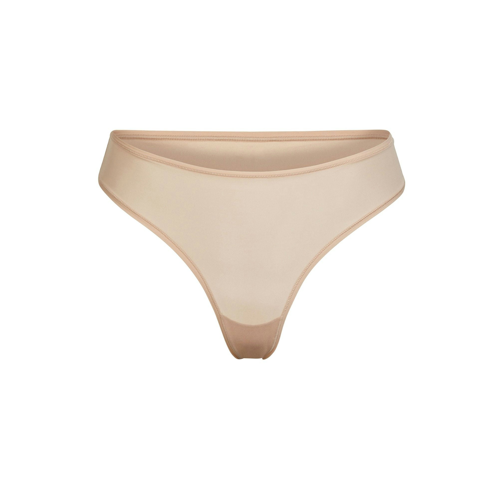 FITS EVERYBODY THONG | MICA (THONGS, PANTIES) LAYS FLAT ON A WHITE BACKGROUND | FLT