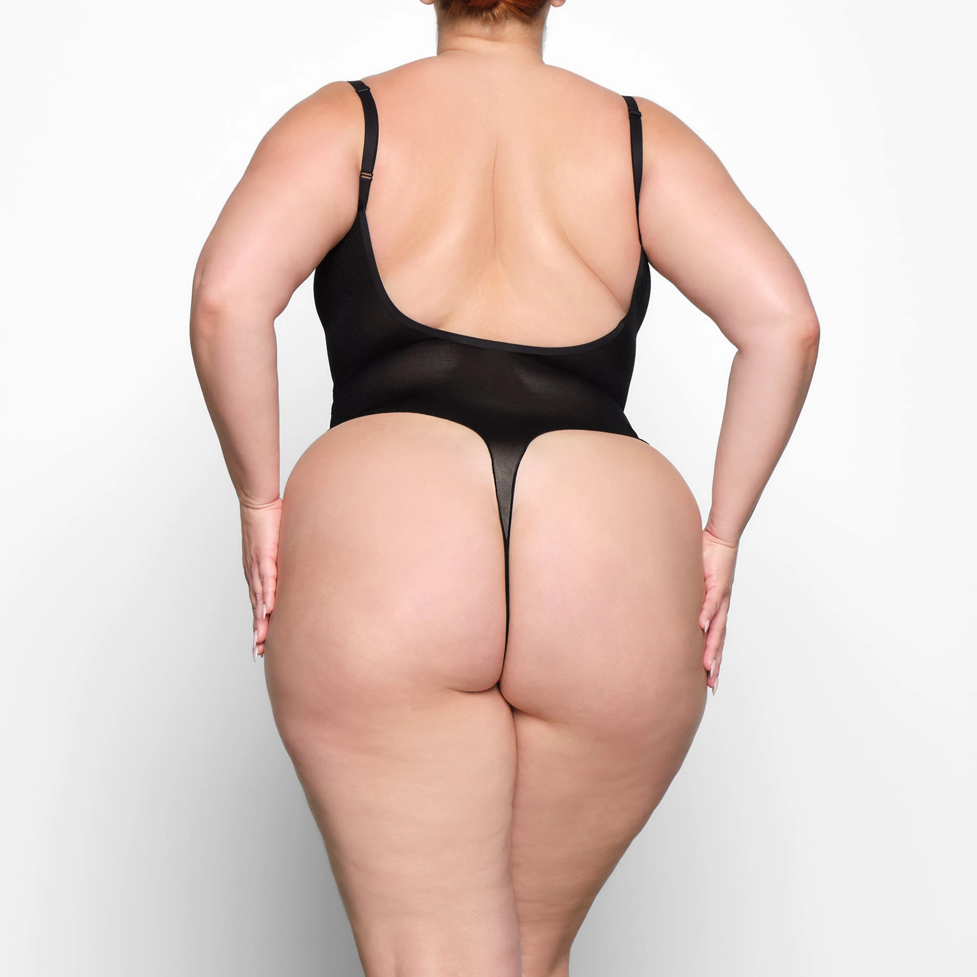 SHEER SCULPT BODYSUIT WORN BY A MODEL IN BACK VIEW