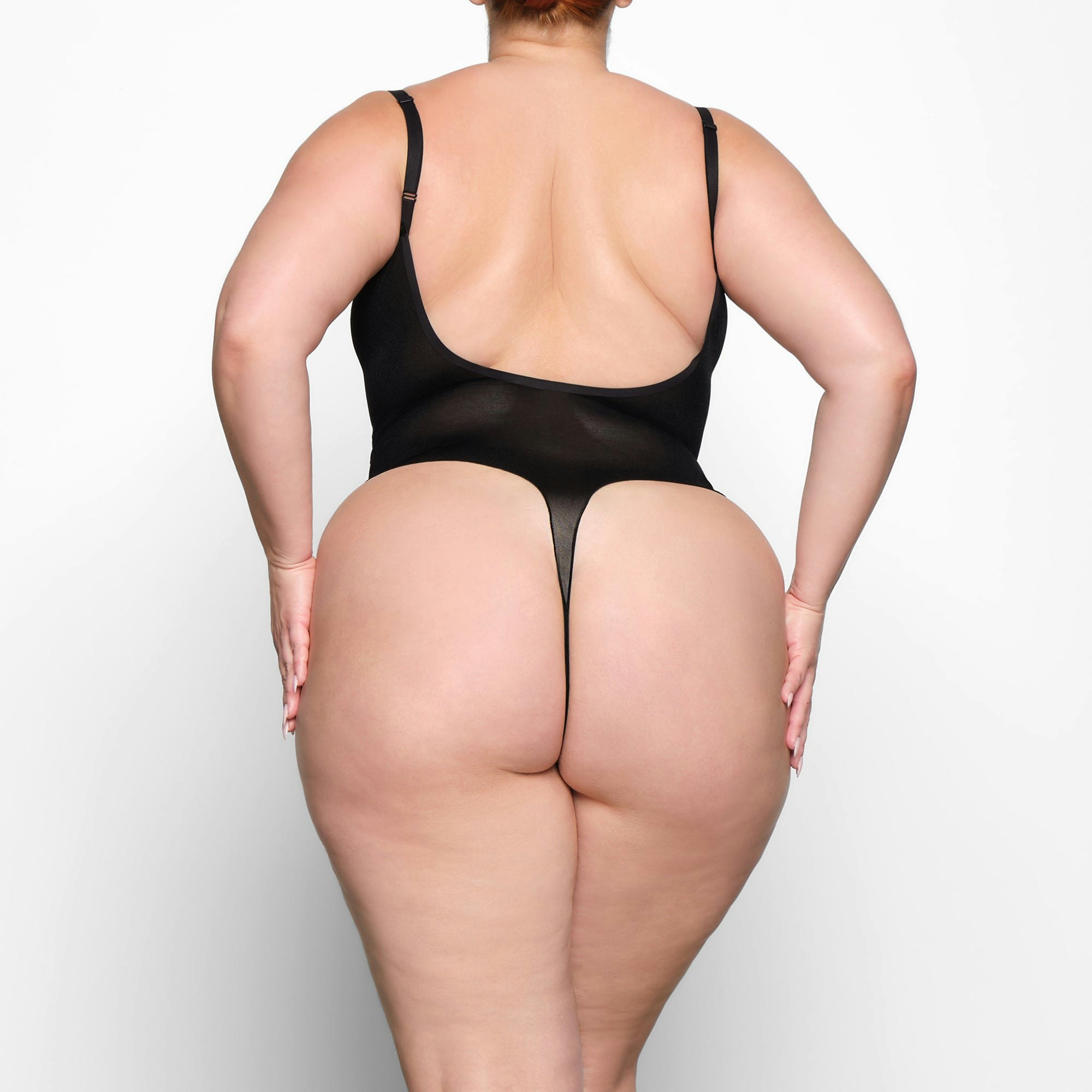 SHEER SCULPT BODYSUIT WORN BY A MODEL IN BACK VIEW